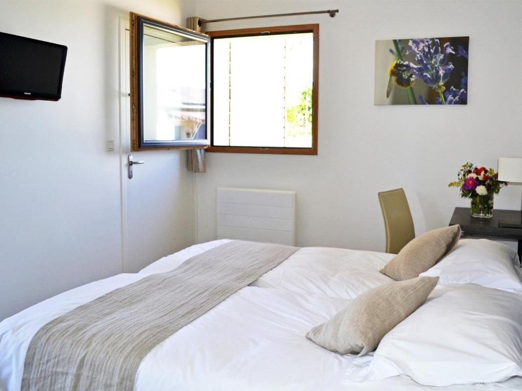 Gites & Tiny Houses Les Hauts De Toulvern Baden Quarto foto